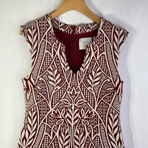 HD in Paris cream and rust knit botanical print sleeveless V-neck dress.